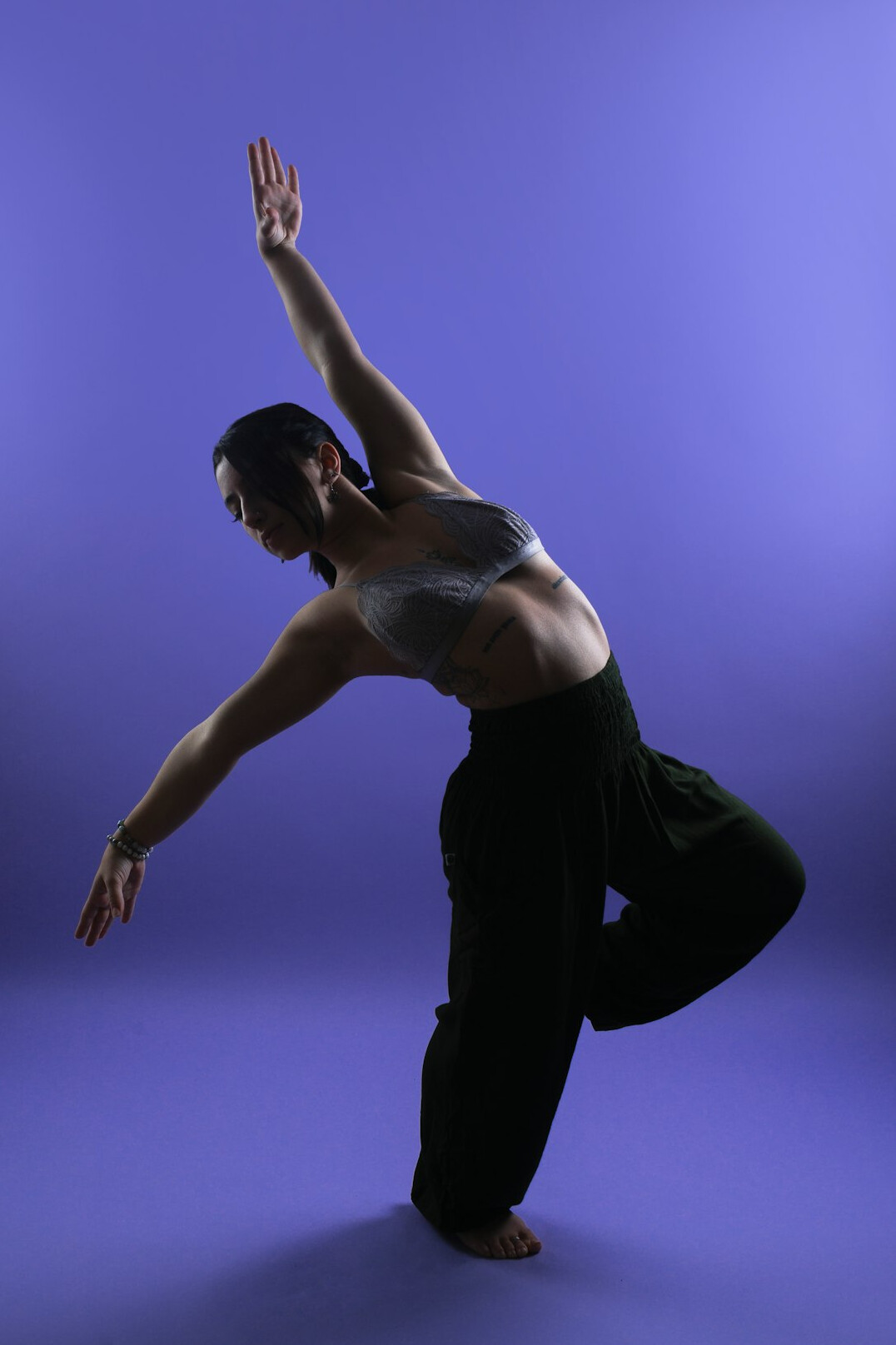 Student practicing body language and movement exercise in a studio